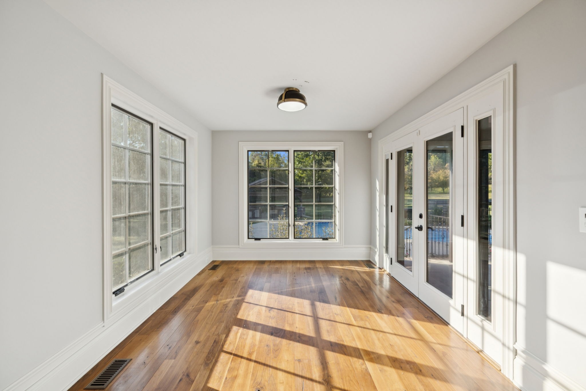 1856 Mires Road Mount Juliet, TN 37122 - Photo 51 of 93 a view of an empty room with wooden floor and a window