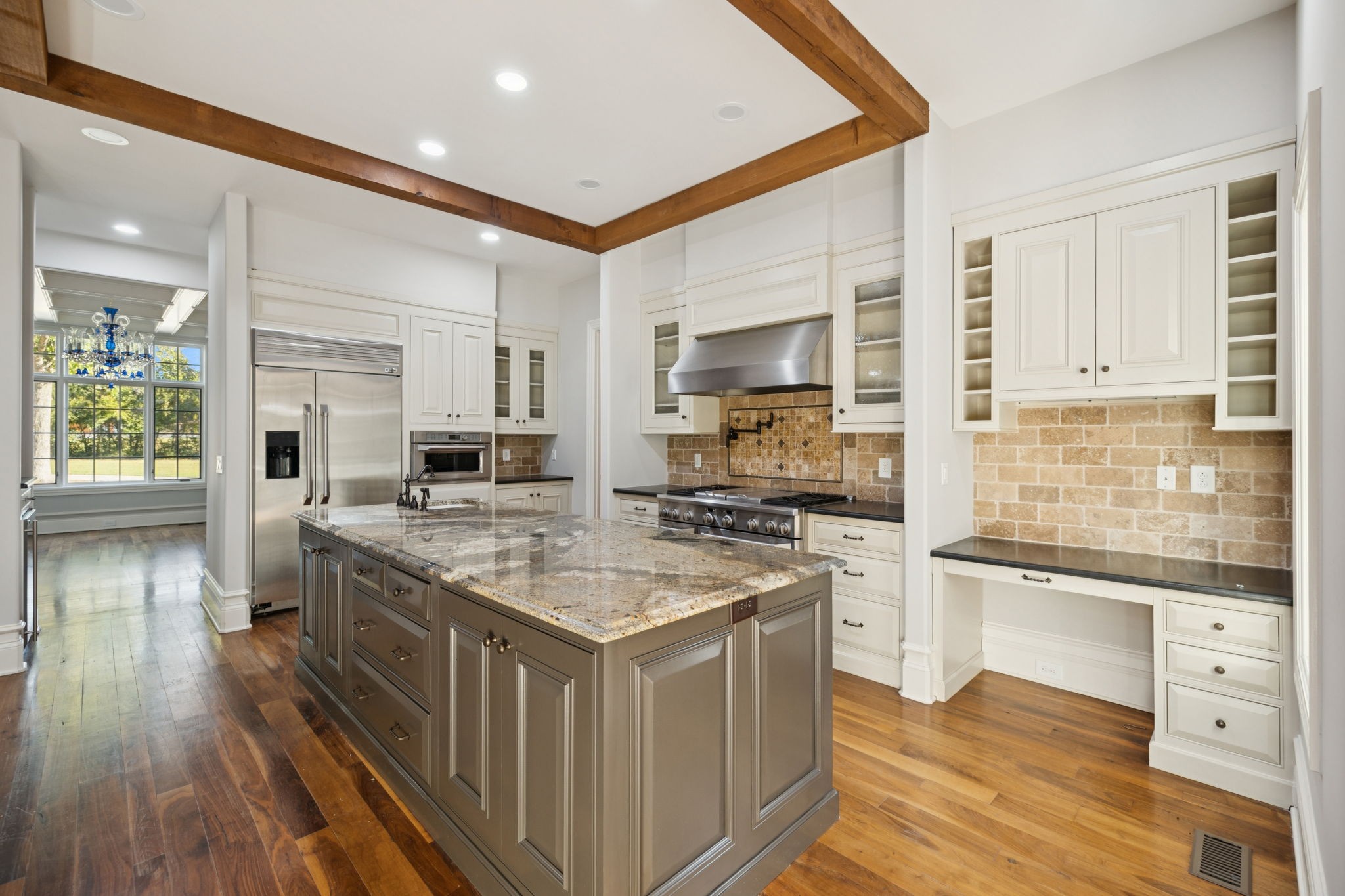 1856 Mires Road Mount Juliet, TN 37122 - Photo 54 of 93 a kitchen with stainless steel appliances granite countertop a stove top oven a sink dishwasher and a refrigerator with wooden floor