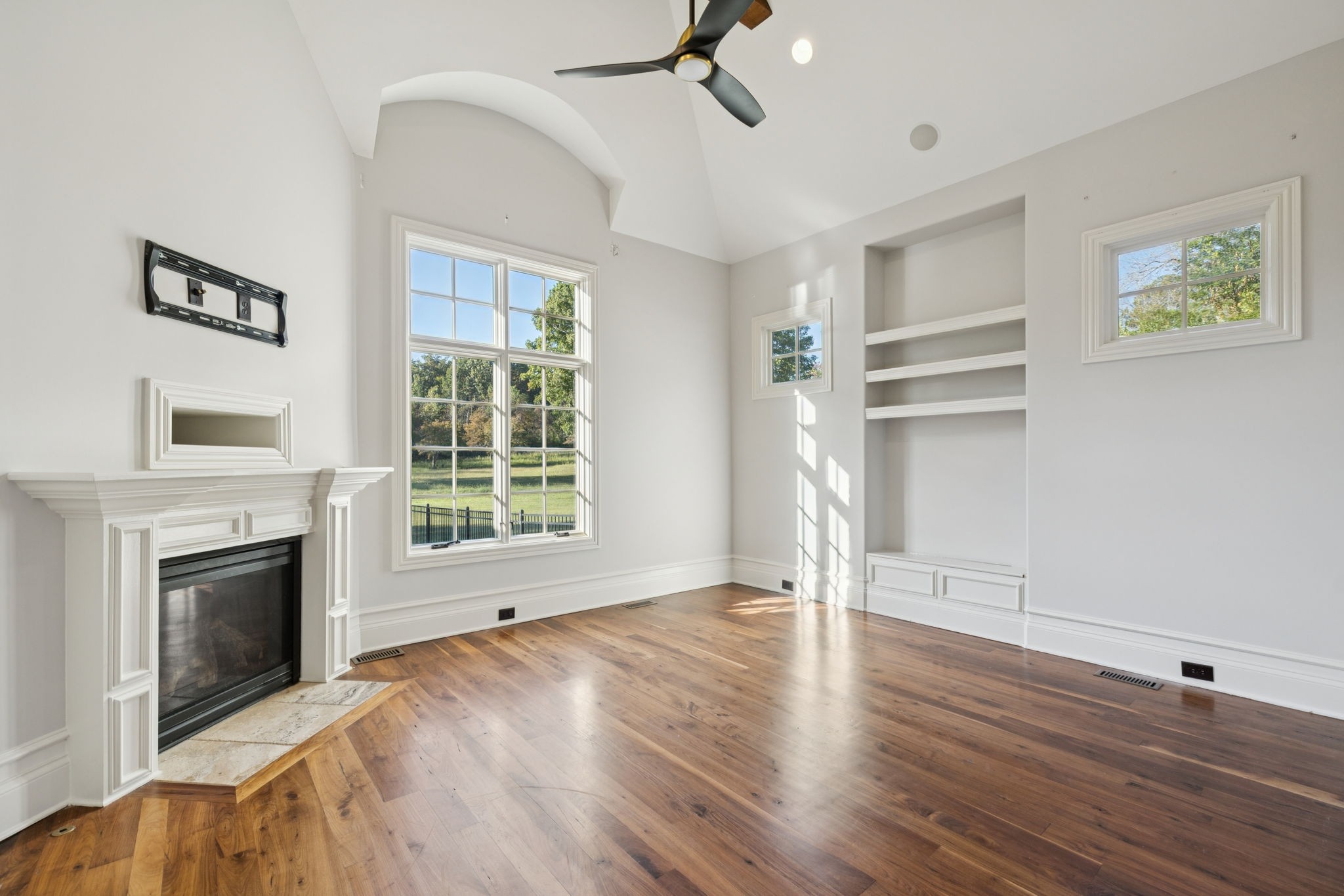 1856 Mires Road Mount Juliet, TN 37122 - Photo 72 of 93 a view of empty room with wooden floor and fireplace