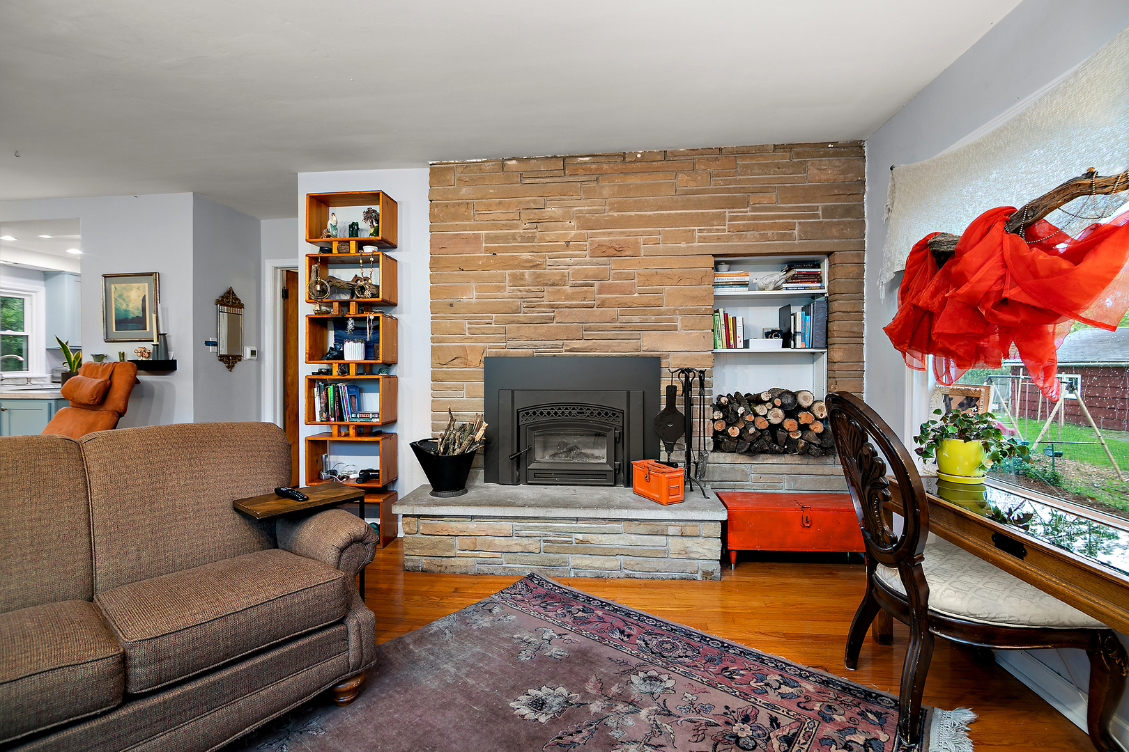 2444 183rd Street Homewood, IL 60430 - Photo 9 of 25 a living room with furniture and a fireplace