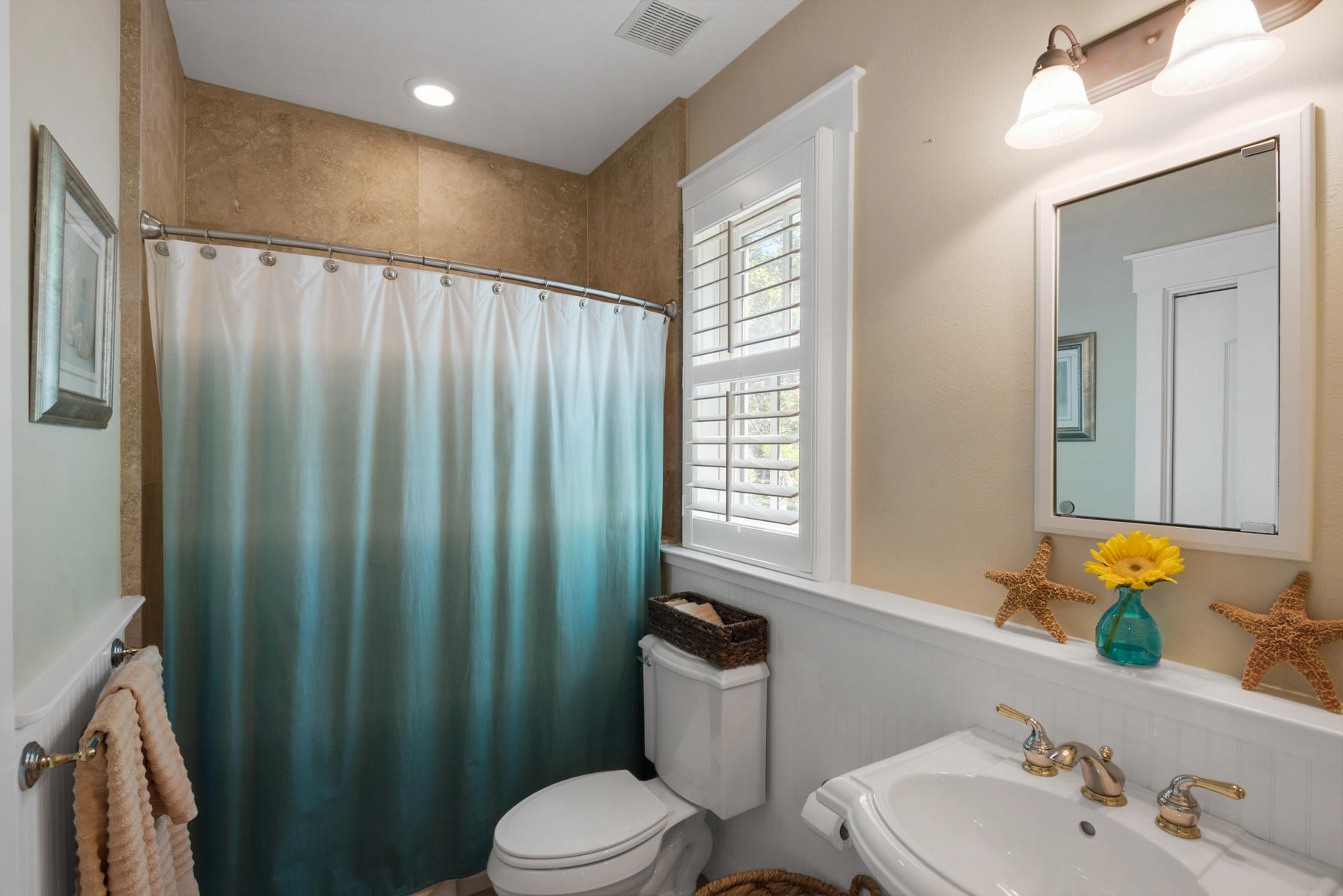 31 Sunset Beach Blvd Inlet Beach Inlet Beach, FL 32461 - Photo 14 of 28 a bathroom with a sink a toilet and shower curtain
