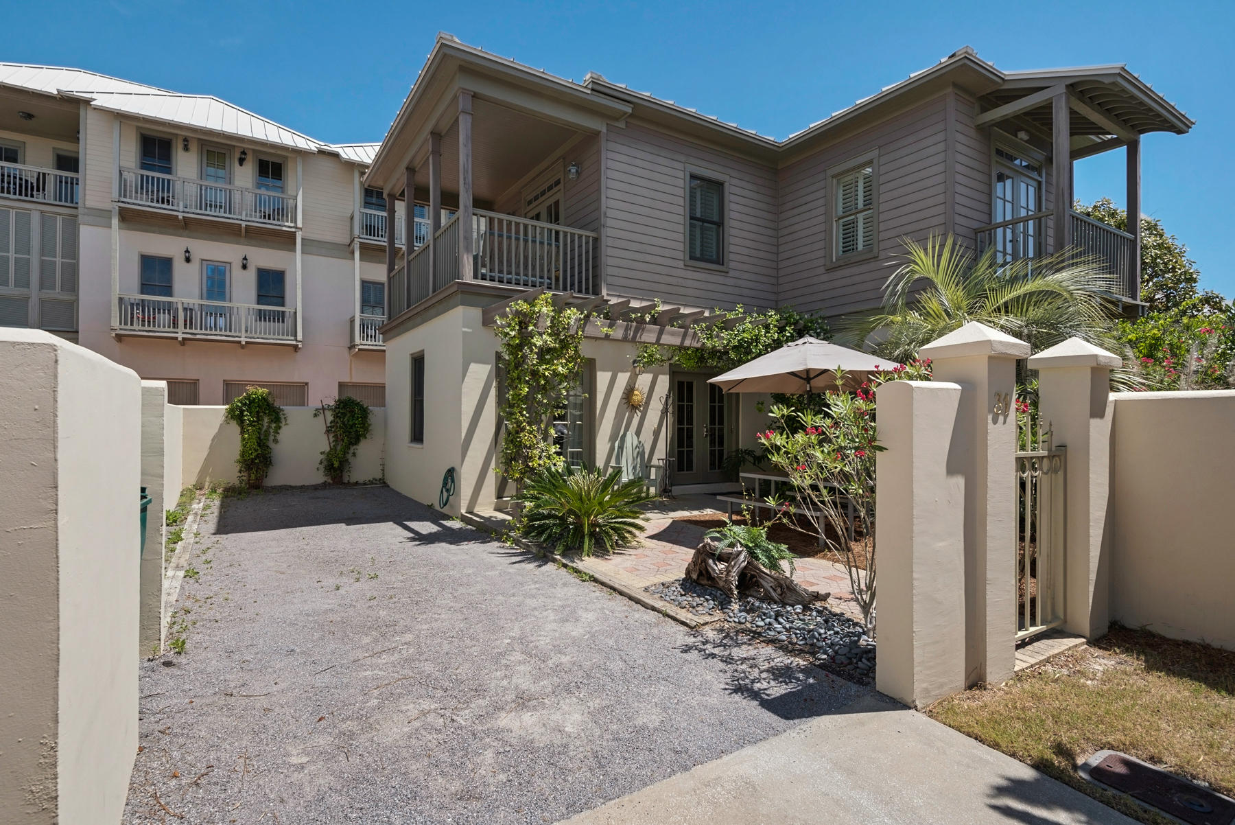 31 Sunset Beach Blvd Inlet Beach Inlet Beach, FL 32461 - Photo 2 of 28 a view of a house with backyard and shower