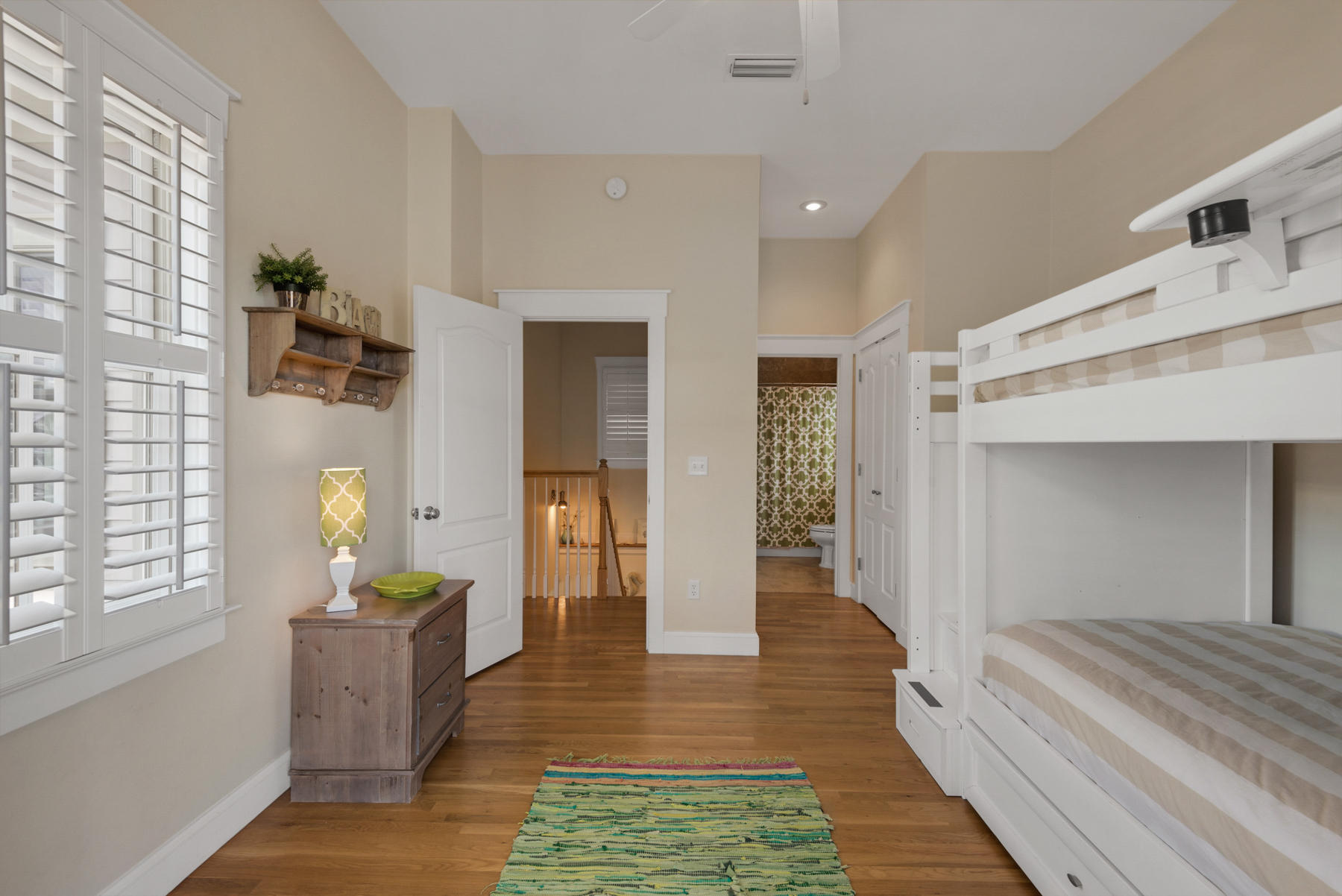 31 Sunset Beach Blvd Inlet Beach Inlet Beach, FL 32461 - Photo 21 of 28 a hallway with white doors wooden floor and front door