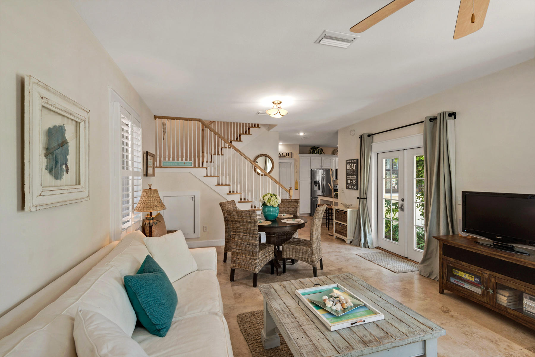 31 Sunset Beach Blvd Inlet Beach Inlet Beach, FL 32461 - Photo 5 of 28 a living room with furniture and a flat screen tv