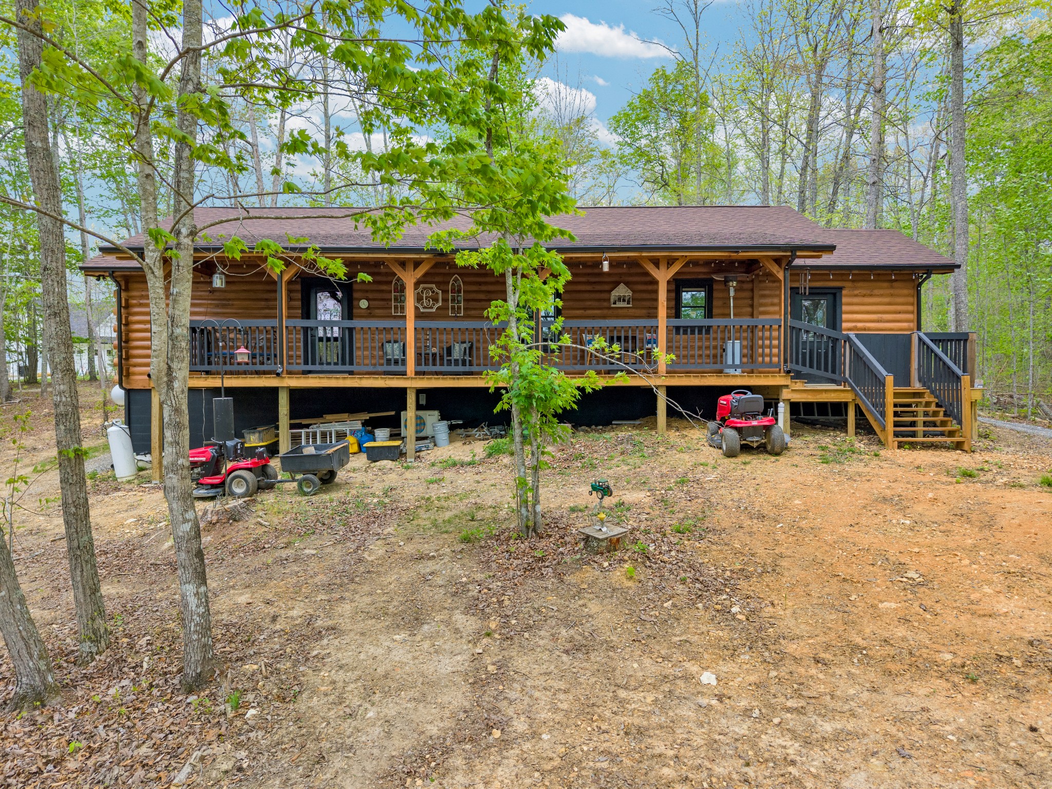 673 Arrowhead Road Moss, TN 38575 - Photo 3 of 31 an outdoor space with lots of trees and plants