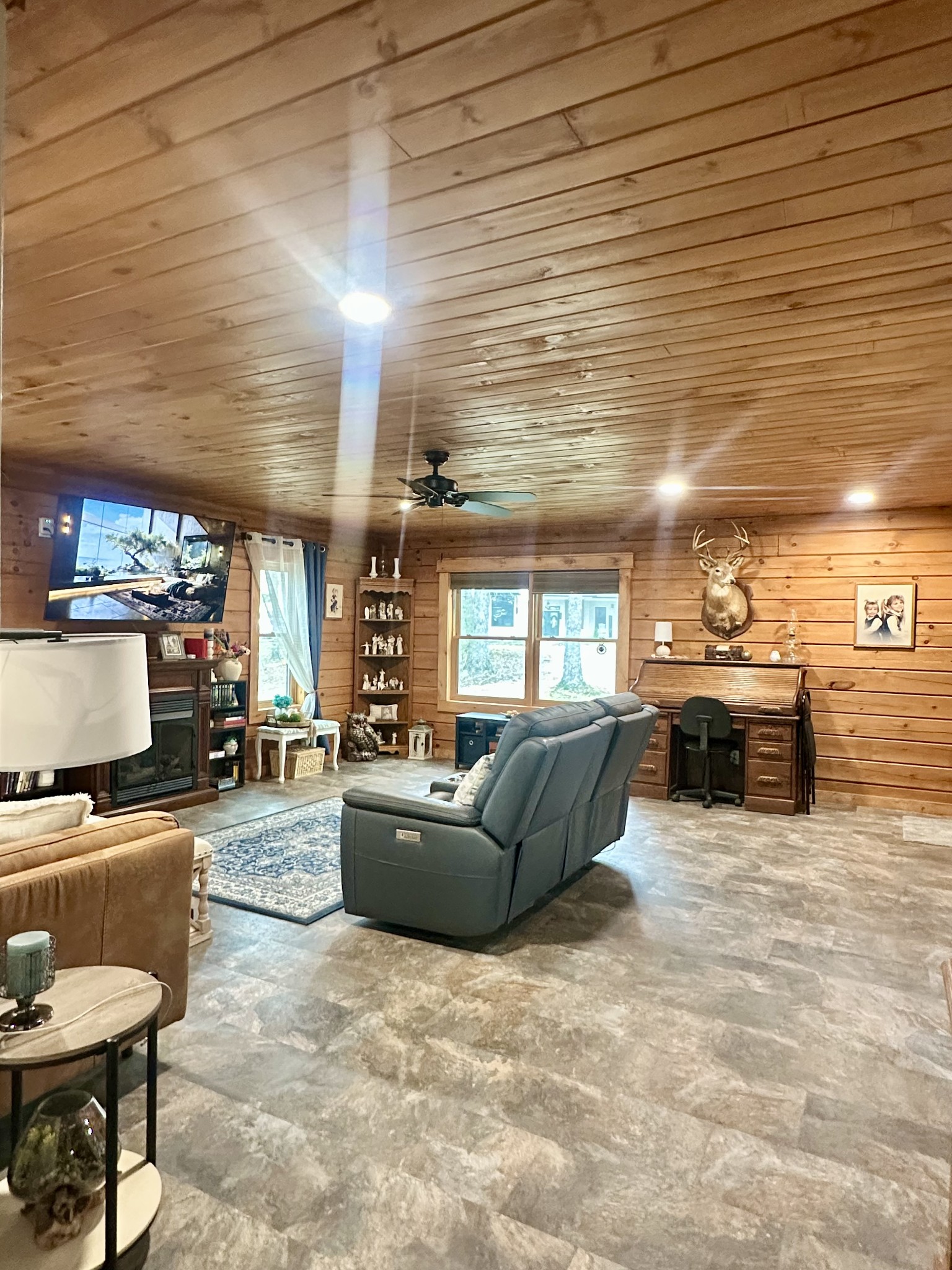 673 Arrowhead Road Moss, TN 38575 - Photo 9 of 31 a living room with furniture and a flat screen tv