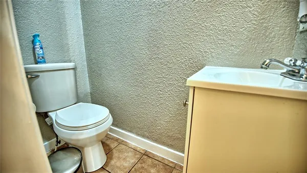 a bathroom with a sink and a toilet