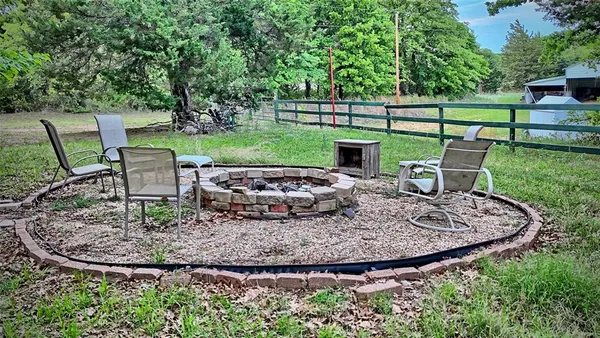 a view of a garden with patio