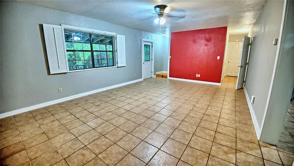 an empty room with windows