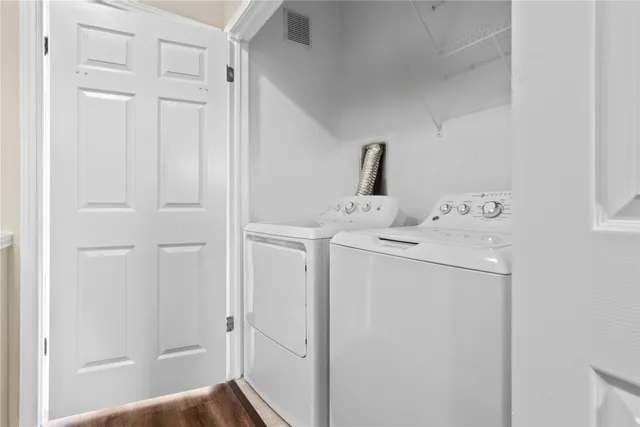 a utility room with dryer and washer