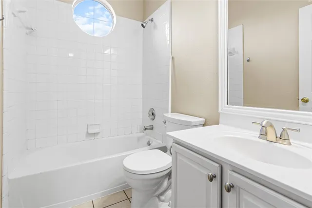 a bathroom with a sink a toilet and a bathtub