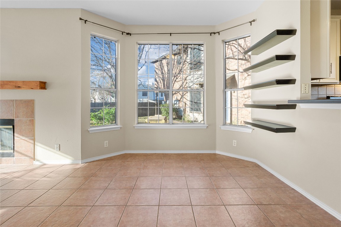 12401 Los Indios Trail, Unit 44 Austin, TX 78729 - Photo 7 of 28 a view of an empty room with a window