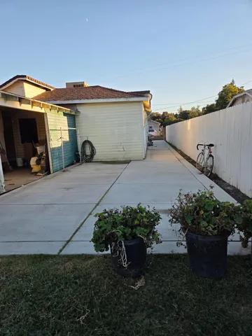 a view of a back yard of the house