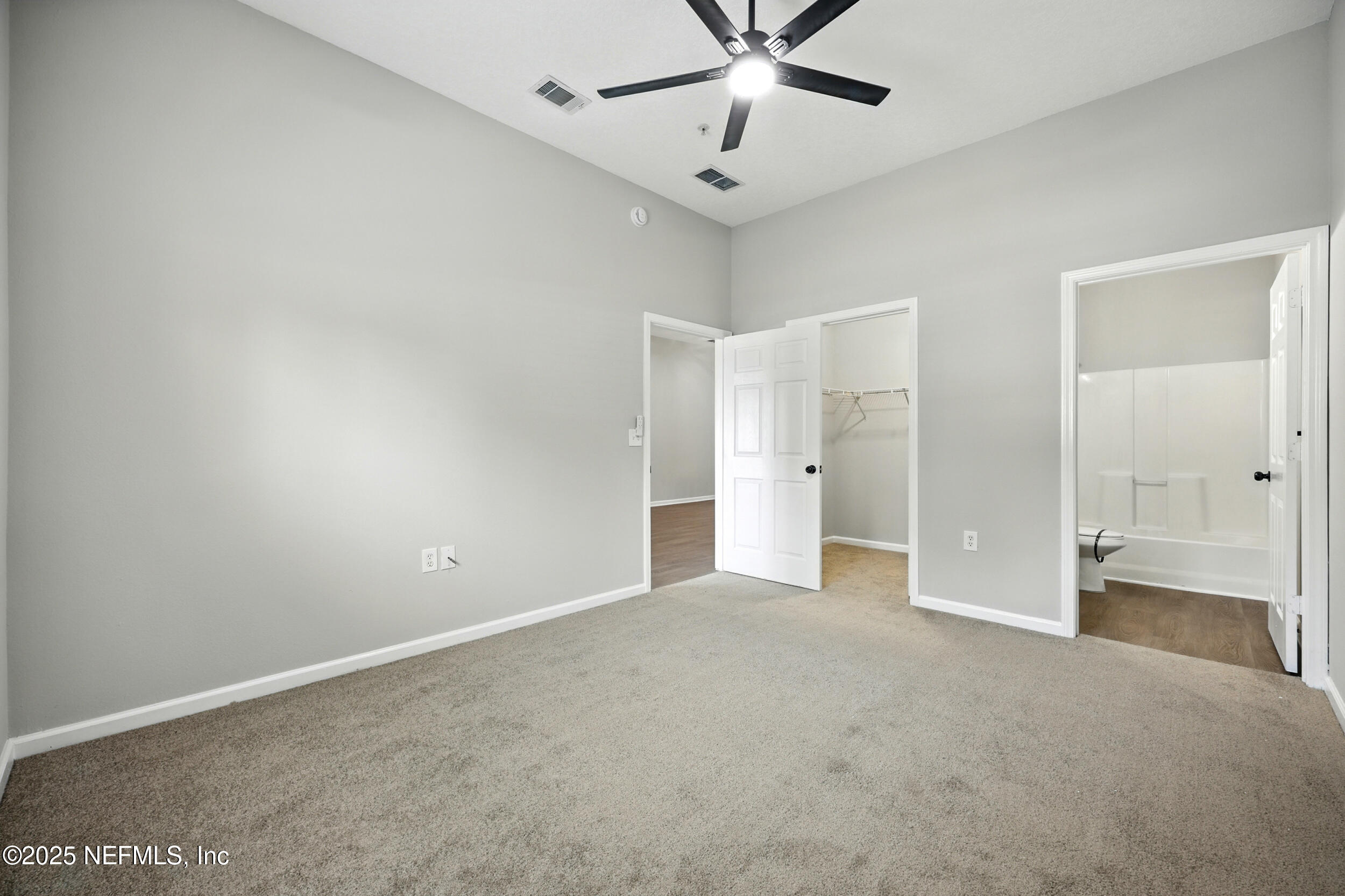 7920 Merrill Road, Unit 107 Jacksonville, FL 32277 - Photo 11 of 26 Primary Bedroom