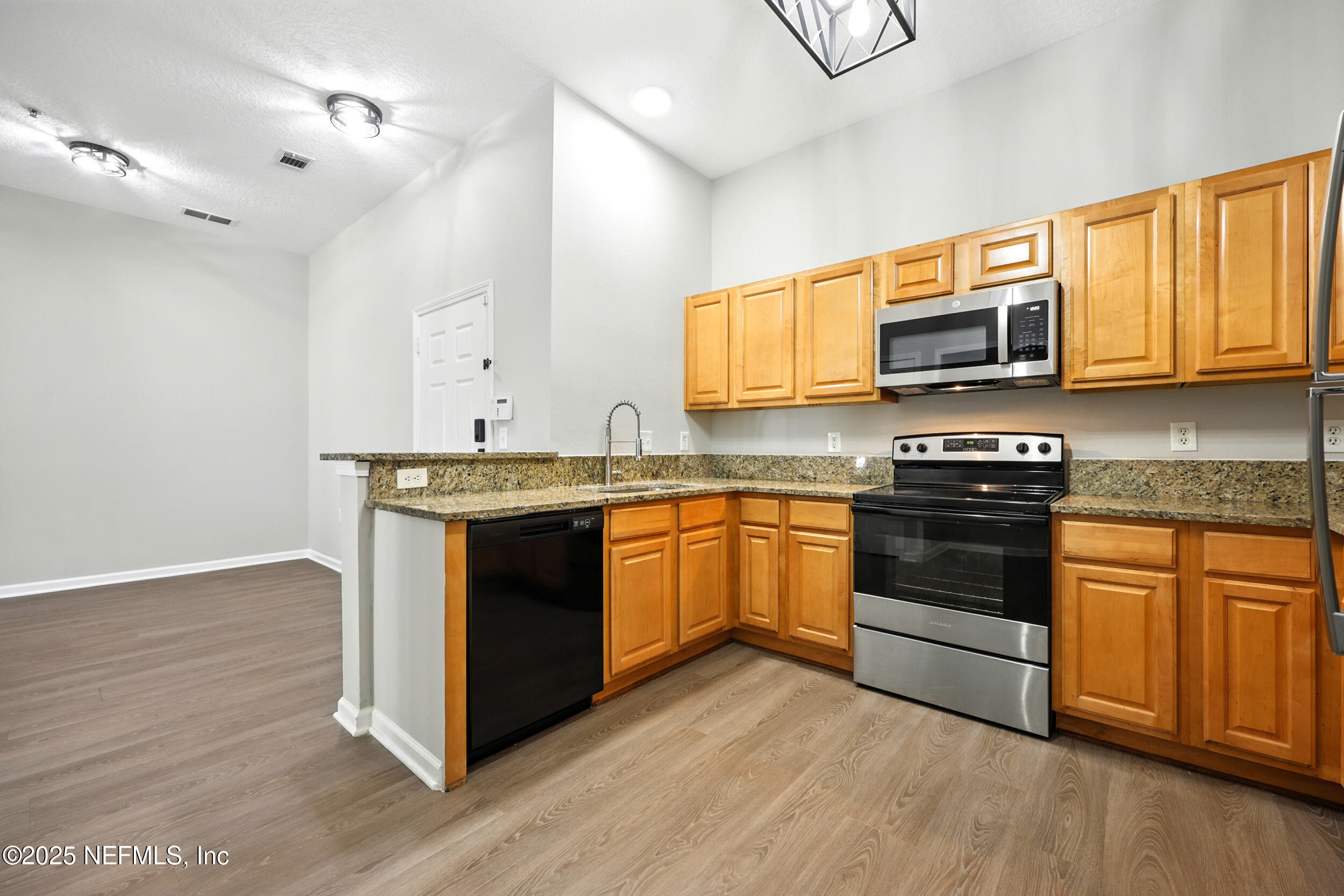 7920 Merrill Road, Unit 107 Jacksonville, FL 32277 - Photo 5 of 26 Kitchen