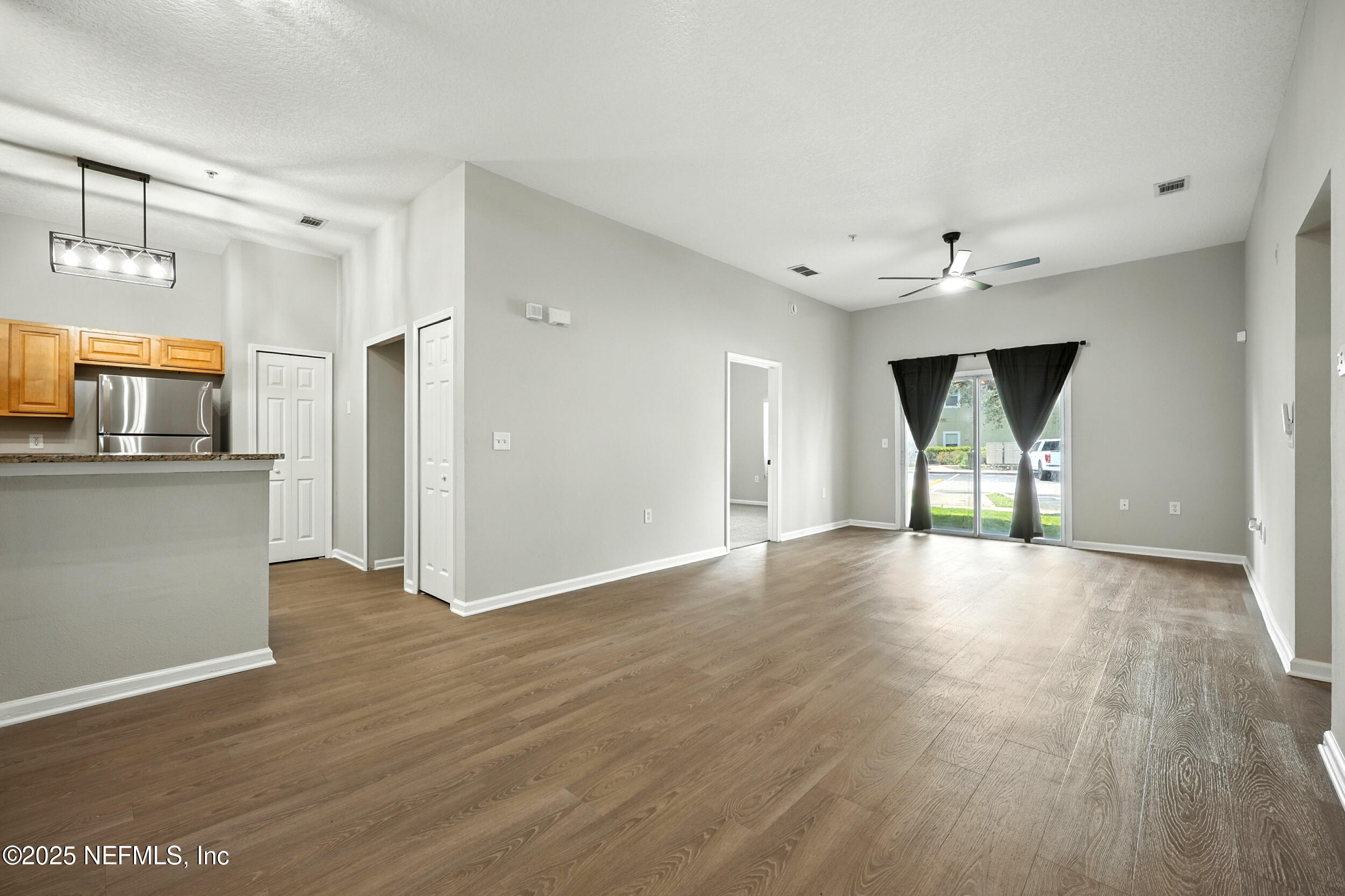 7920 Merrill Road, Unit 107 Jacksonville, FL 32277 - Photo 6 of 26 Open Living Space