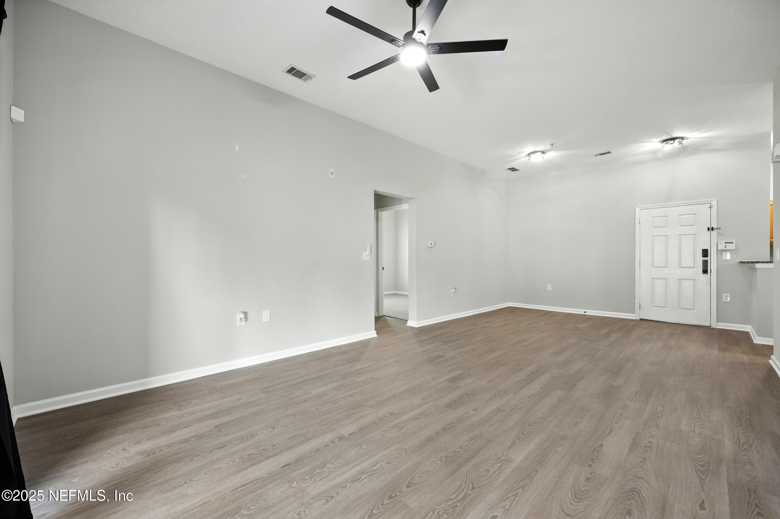 7920 Merrill Road, Unit 107 Jacksonville, FL 32277 - Photo 7 of 26 Open Living Space