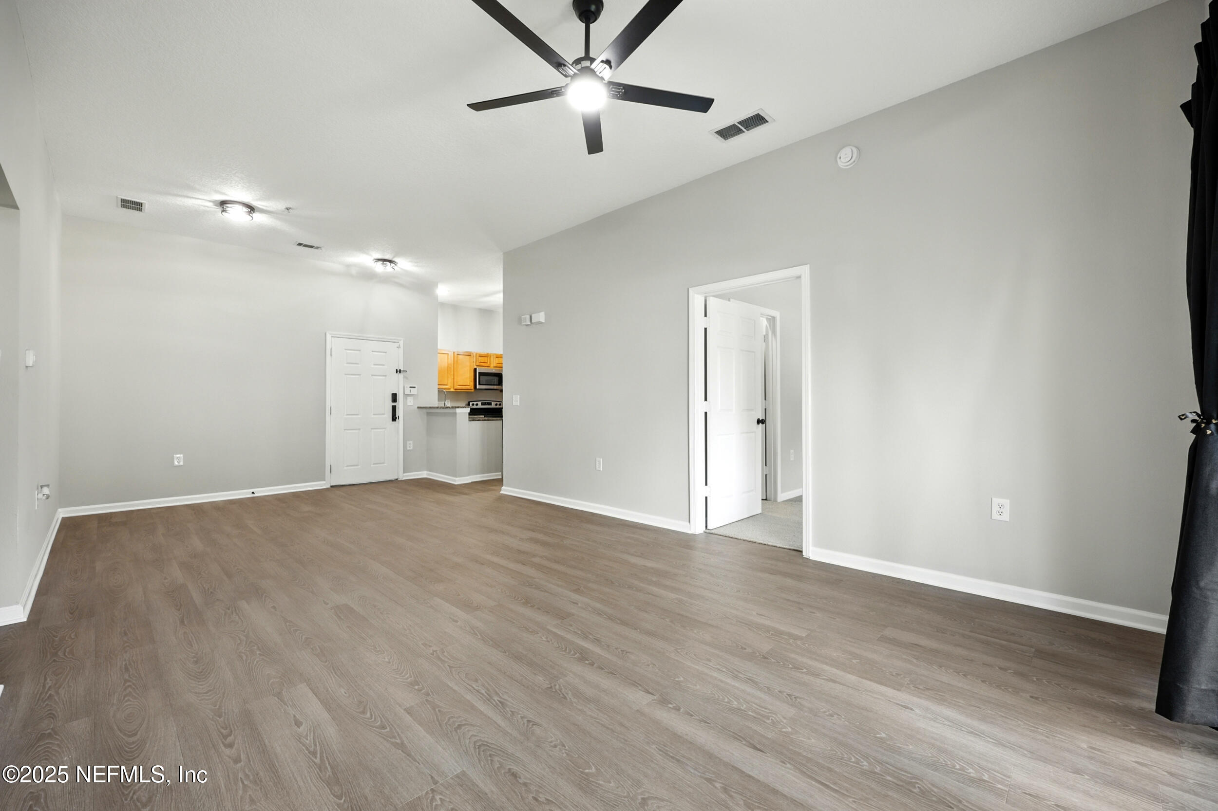7920 Merrill Road, Unit 107 Jacksonville, FL 32277 - Photo 8 of 26 Open Living Space