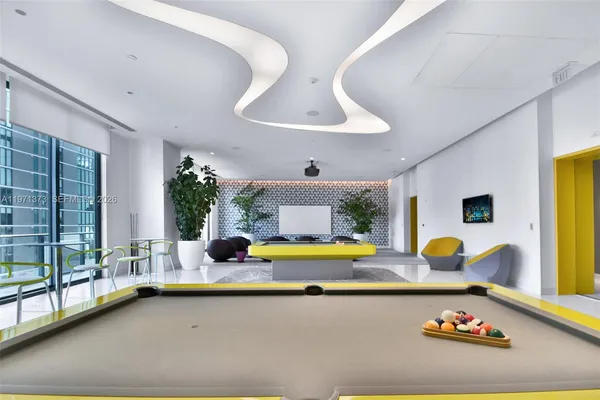 a view of a chairs with sitting area