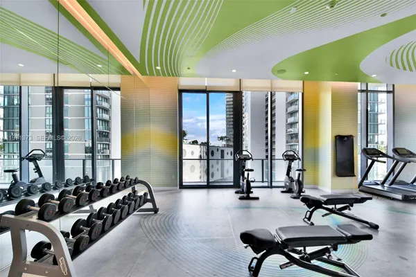 a view of a patio with a table and chairs