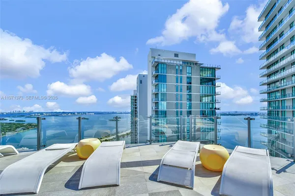 a view of a balcony with city view