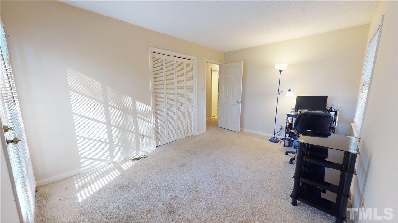 1503 Cole Mill Road Durham, NC 27705 - Photo 16 of 29 a view of room with refrigerator and flat screen tv