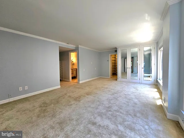 an empty room with a natural light