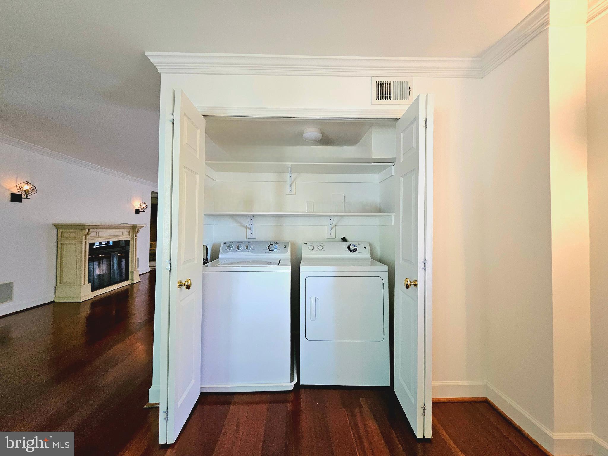 1080 Wisconsin Avenue Northwest, Unit 103/104 Washington, DC 20007 - Photo 27 of 37 a view of a storage & utility room with wooden floor