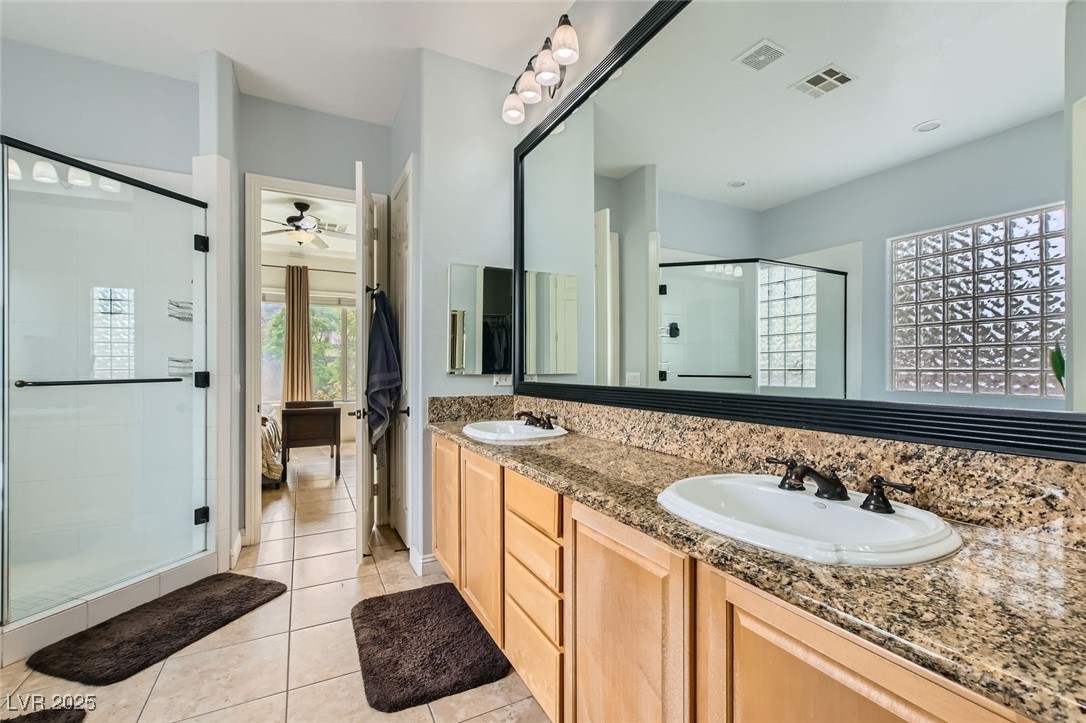7404 Eggshell Drive North Las Vegas, NV 89084 - Photo 17 of 39 Ensuite bathroom with double vanity, linen closet,