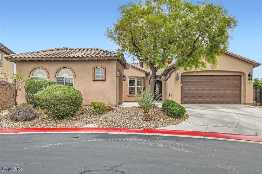 7404 Eggshell Drive North Las Vegas, NV 89084 - Photo 2 of 39 Mediterranean / spanish house with a tile roof, st