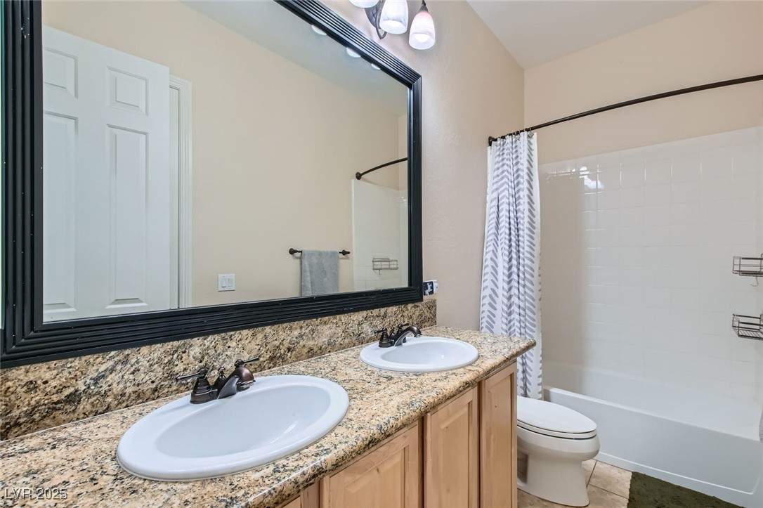 7404 Eggshell Drive North Las Vegas, NV 89084 - Photo 22 of 39 Bathroom #3 featuring toilet, shower / bath combin