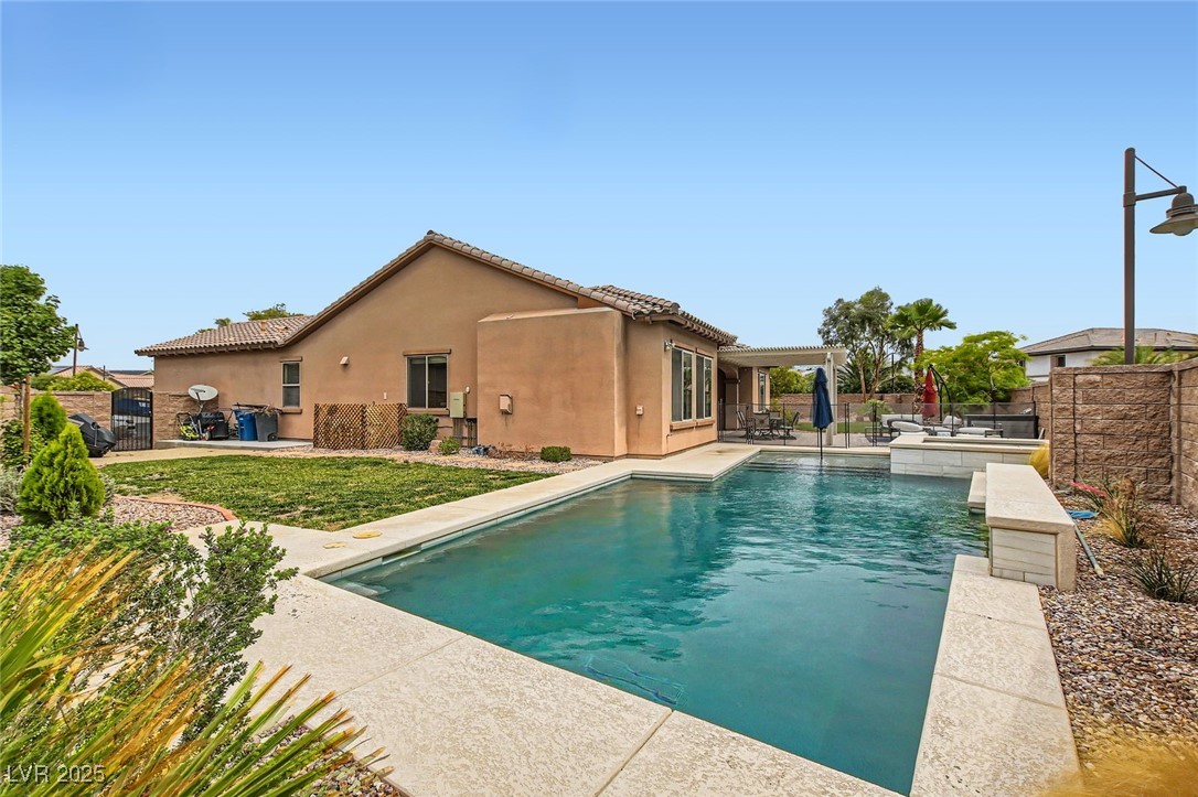 7404 Eggshell Drive North Las Vegas, NV 89084 - Photo 28 of 39 View of swimming pool with a fenced backyard and a