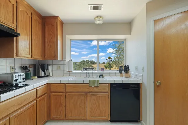 a living room with furniture or couch and a flat screen tv