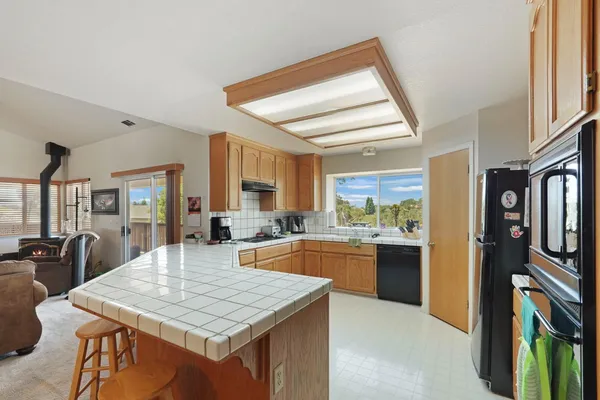 a living room with furniture or couch and a flat screen tv