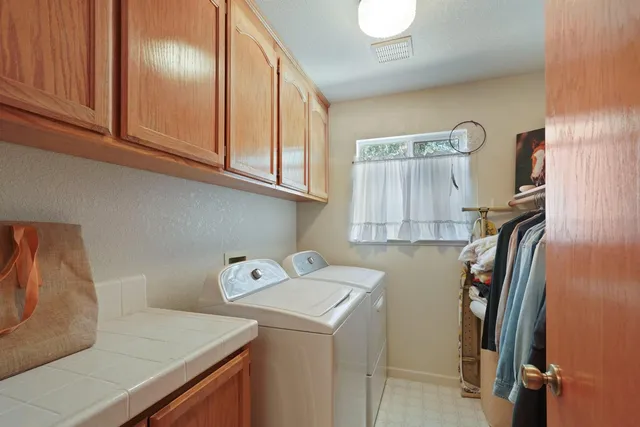 a view of a forest from a balcony