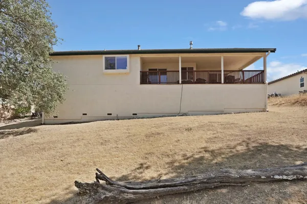 a front view of a house with a garage