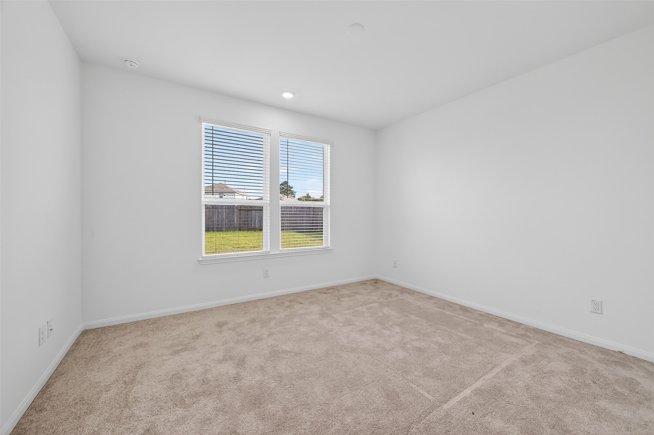 17902 Slurry Rake Lane Hockley, TX 77447 - Photo 20 of 32 an empty room with windows
