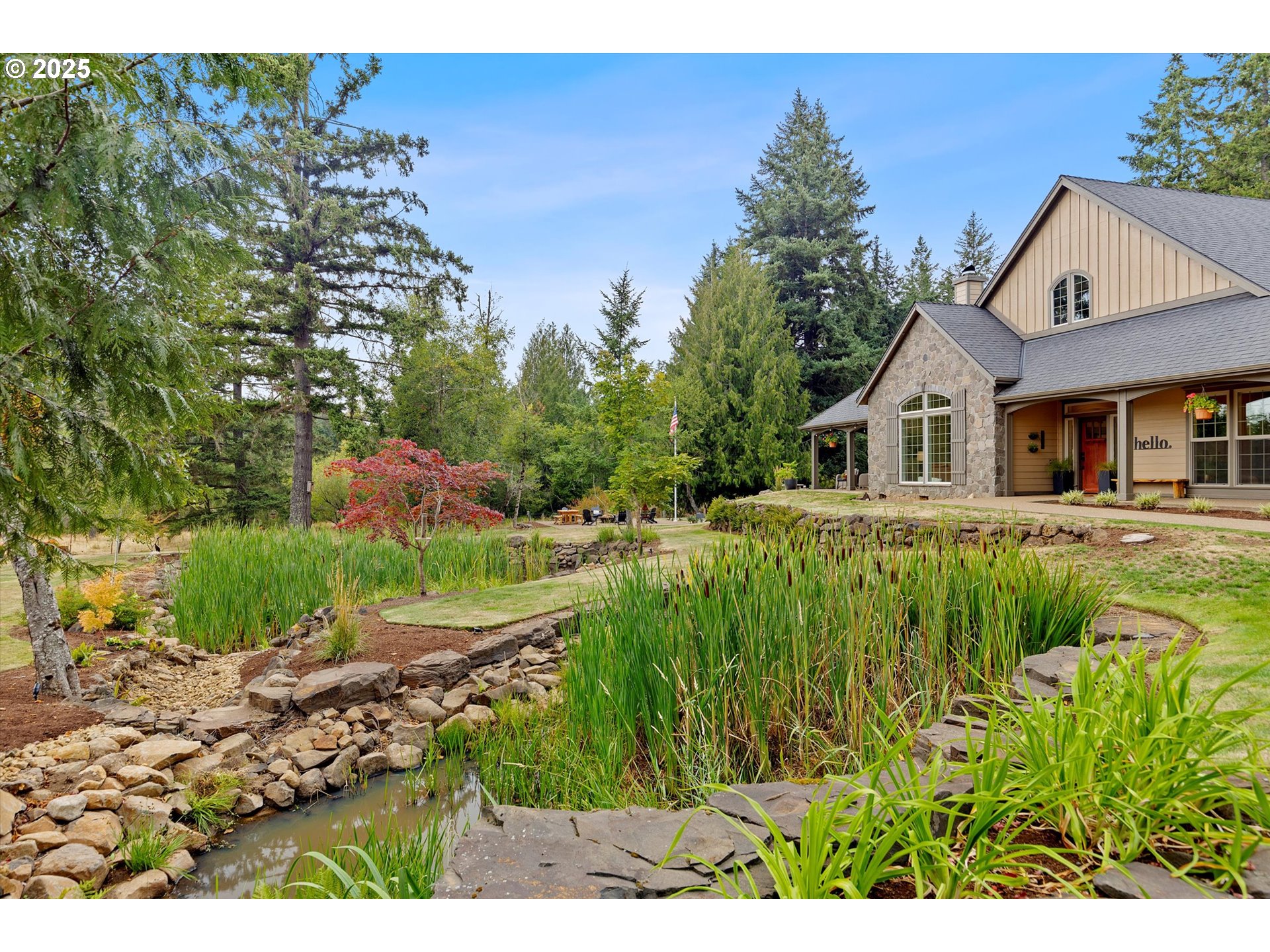 37212 South Sawtell Road Molalla, OR 97038 - Photo 21 of 46 a house view with a garden space