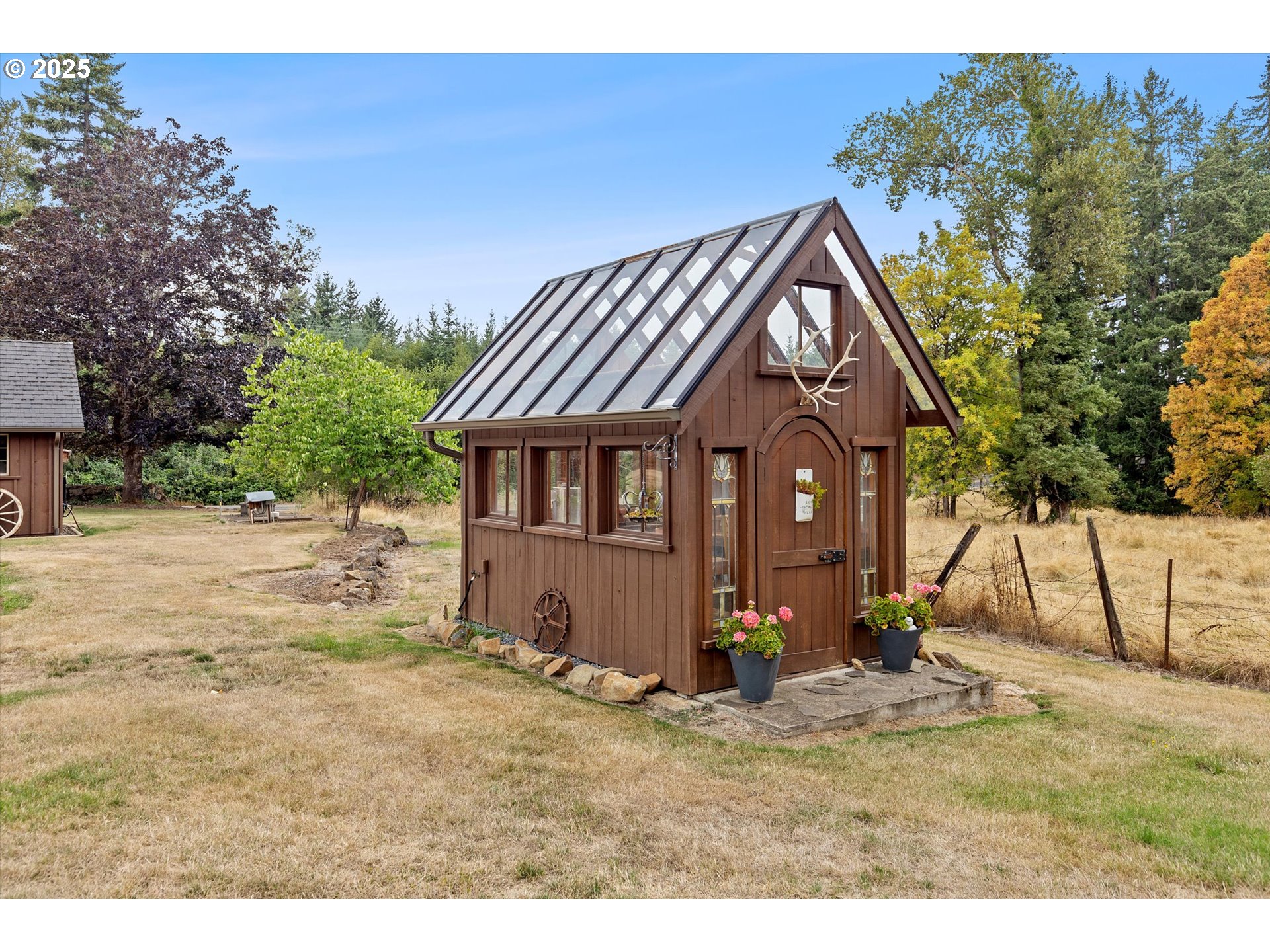 37212 South Sawtell Road Molalla, OR 97038 - Photo 24 of 46 a view of a house with a yard