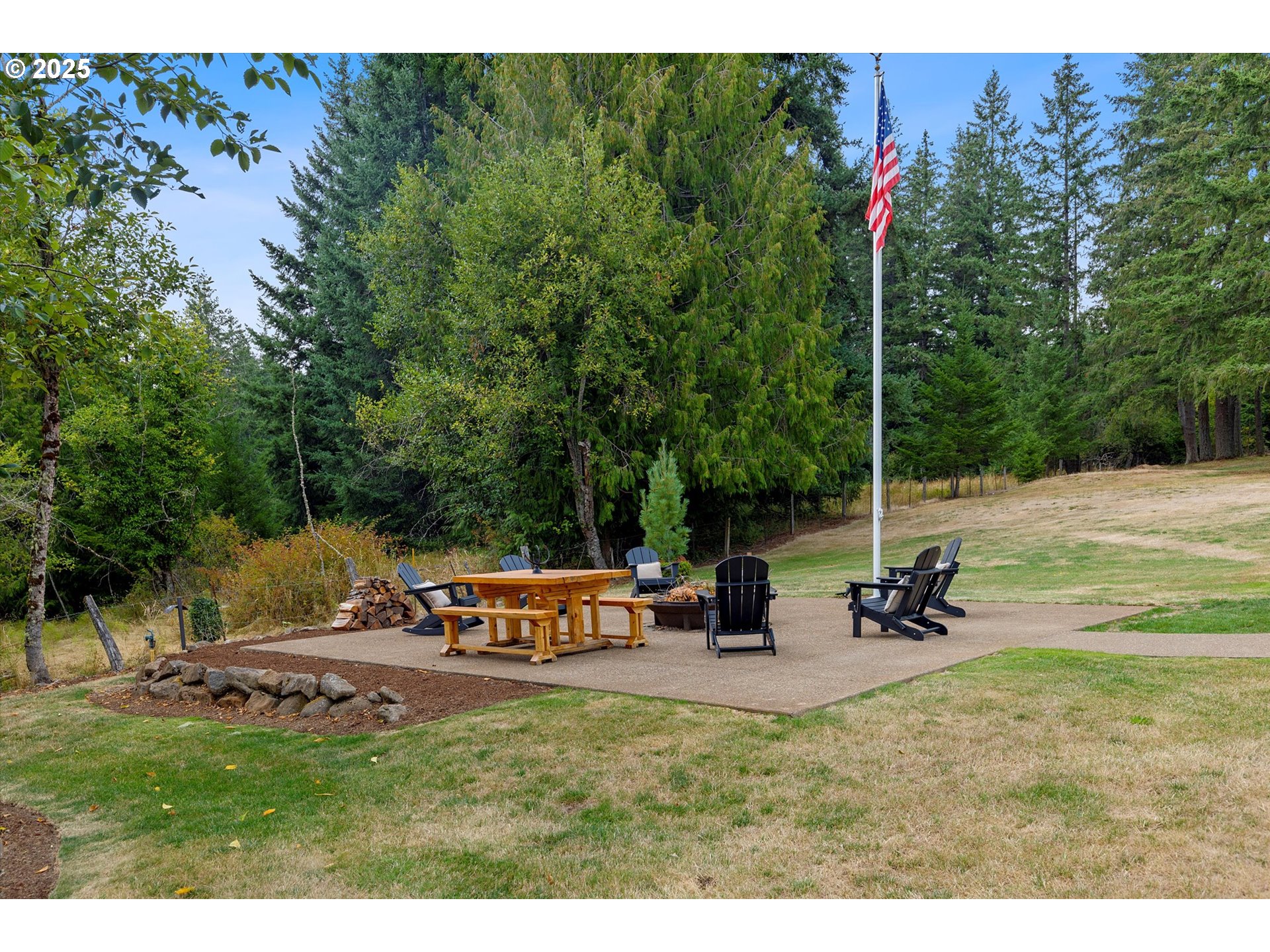 37212 South Sawtell Road Molalla, OR 97038 - Photo 27 of 46 a view of a park with swings and slides
