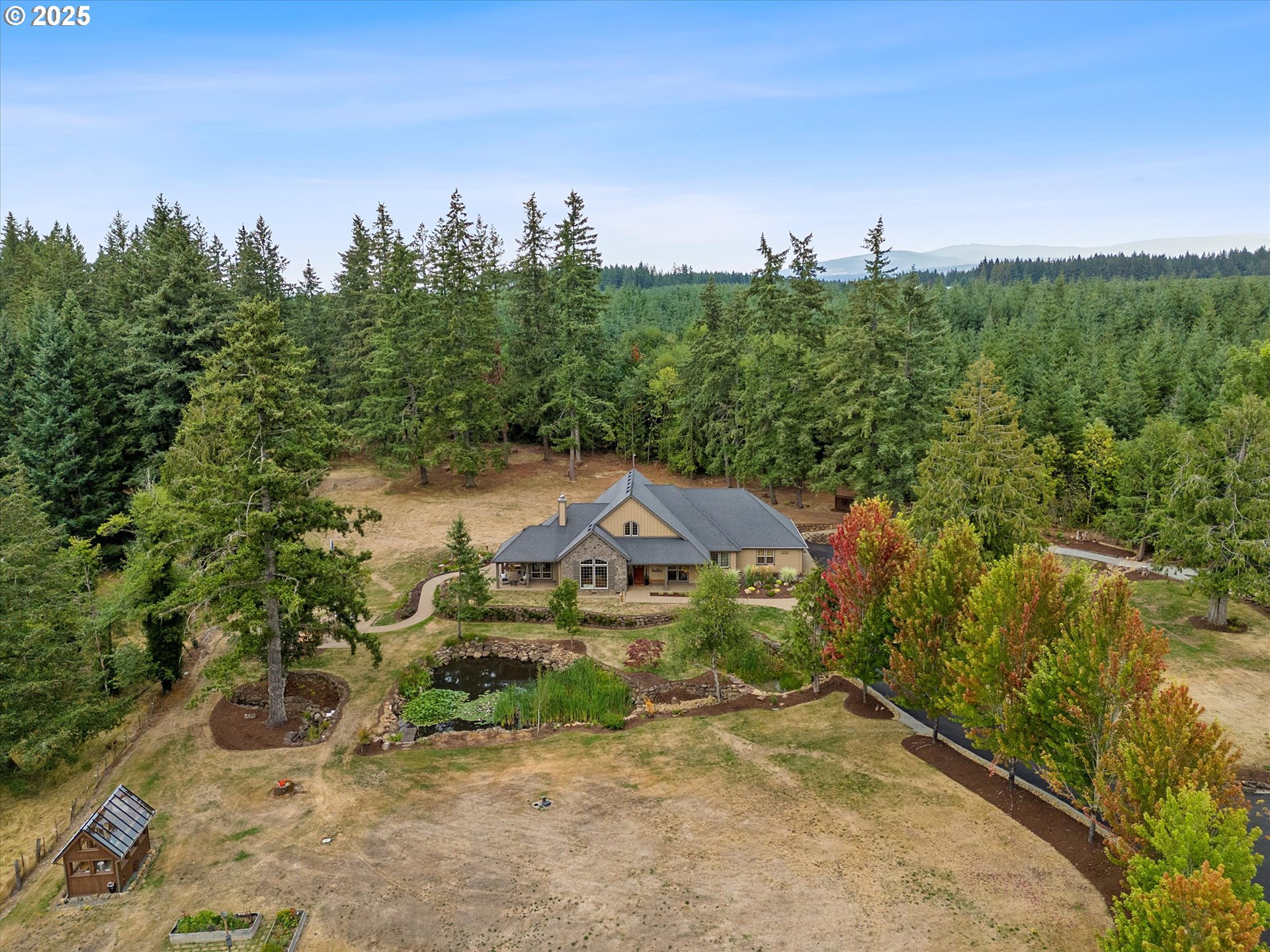 37212 South Sawtell Road Molalla, OR 97038 - Photo 31 of 46 an aerial view of a house