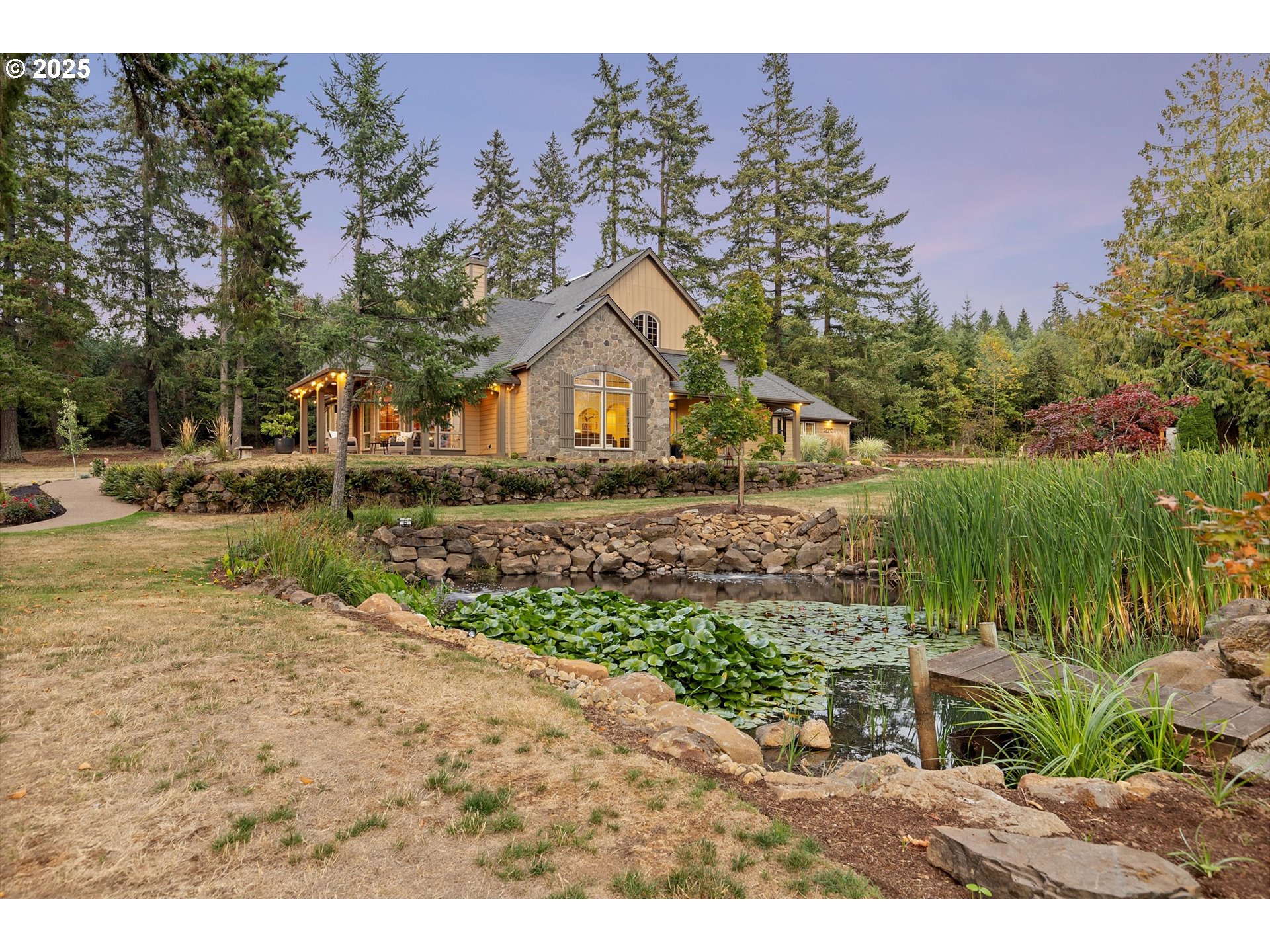 37212 South Sawtell Road Molalla, OR 97038 - Photo 41 of 46 a view of a yard with a house in the background