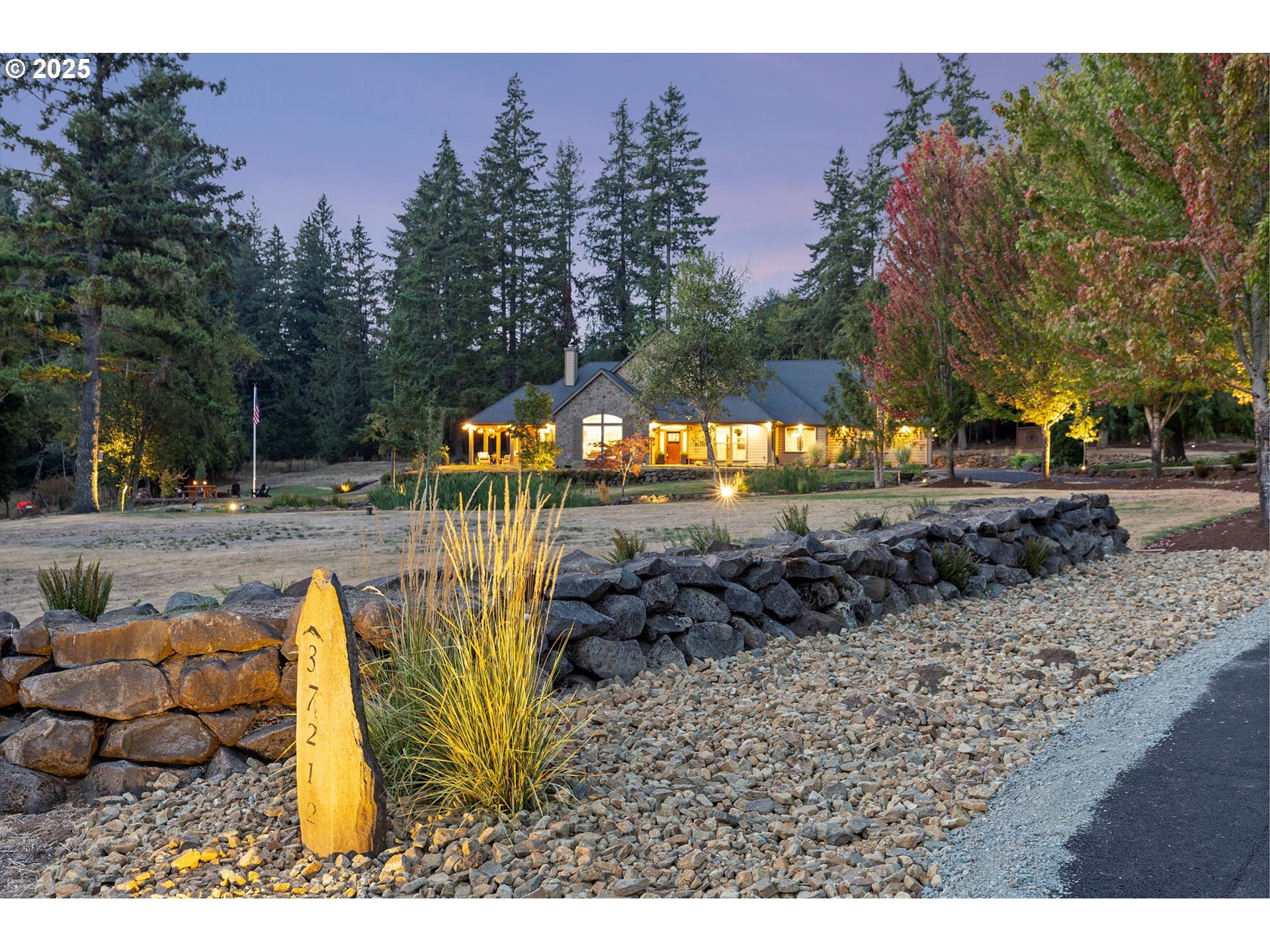 37212 South Sawtell Road Molalla, OR 97038 - Photo 46 of 46 a view of a yard with furniture and a garden
