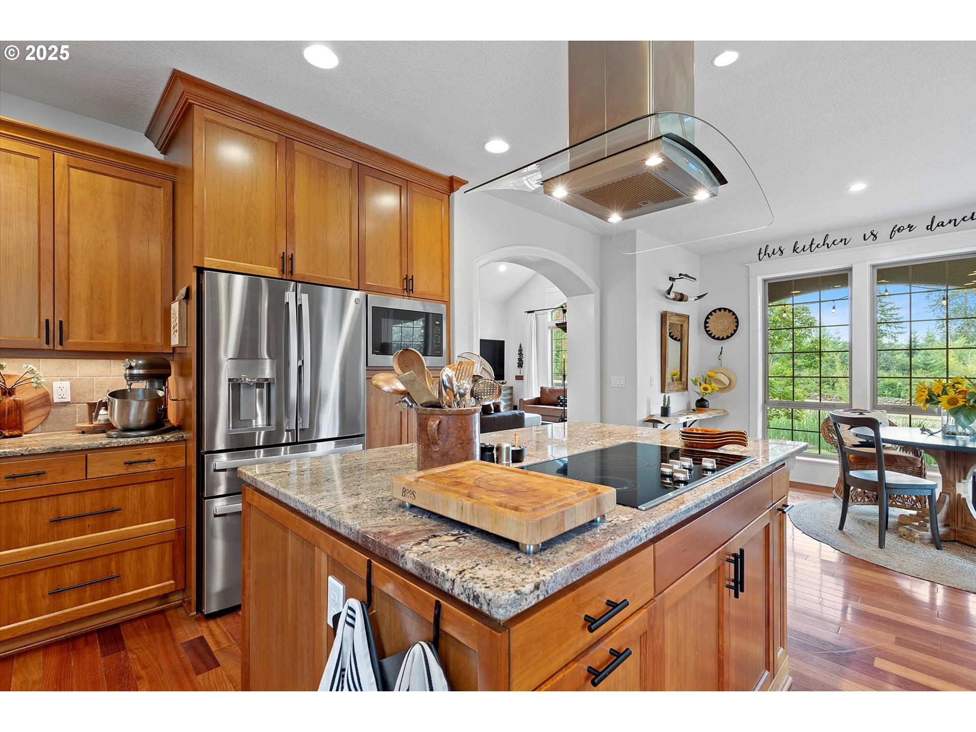 37212 South Sawtell Road Molalla, OR 97038 - Photo 10 of 46 a kitchen with stainless steel appliances granite countertop a sink a stove and a refrigerator