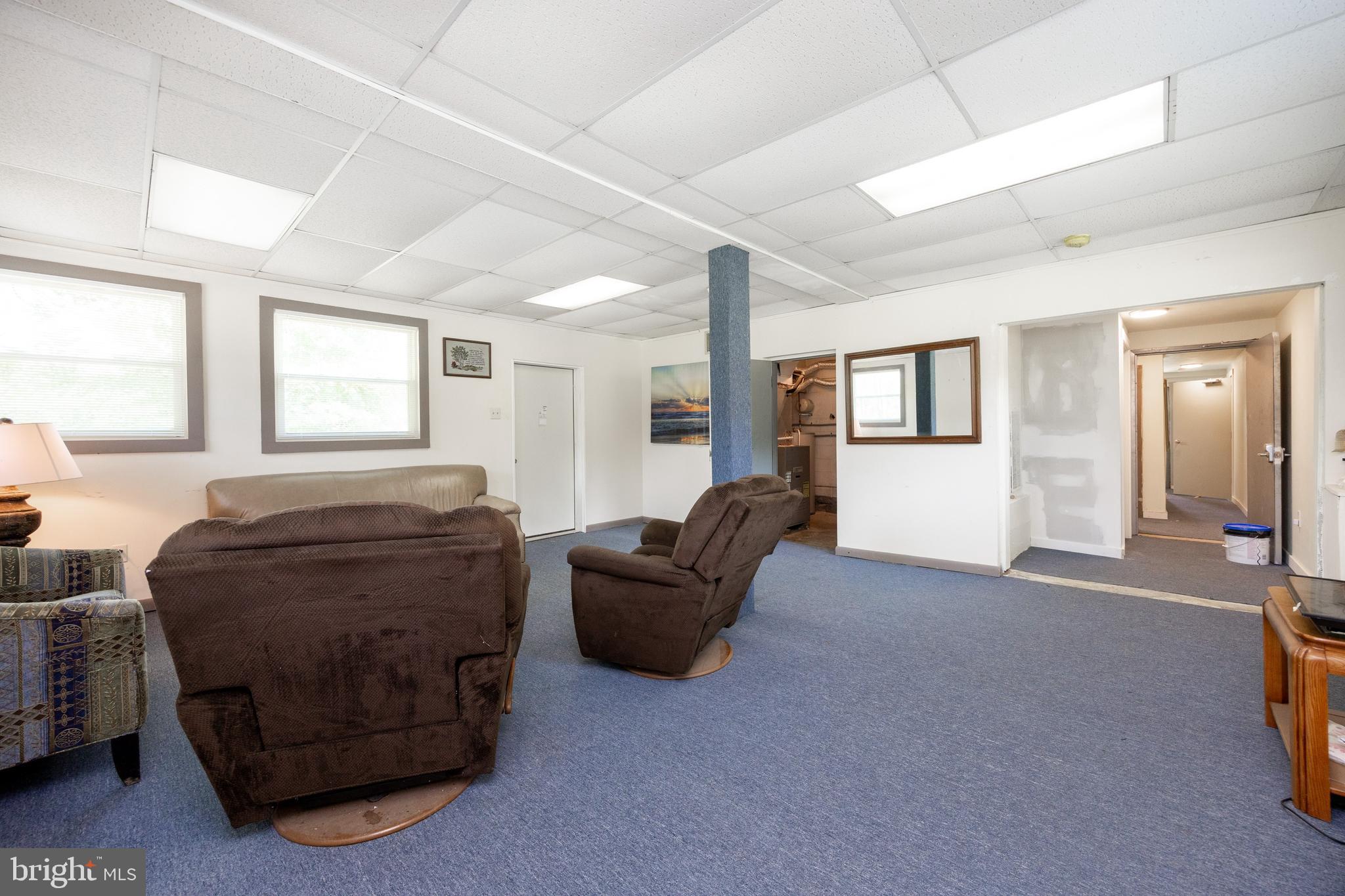 2488 Sanatoga Road Pottstown, PA 19464 - Photo 25 of 92 a living room with furniture and a window