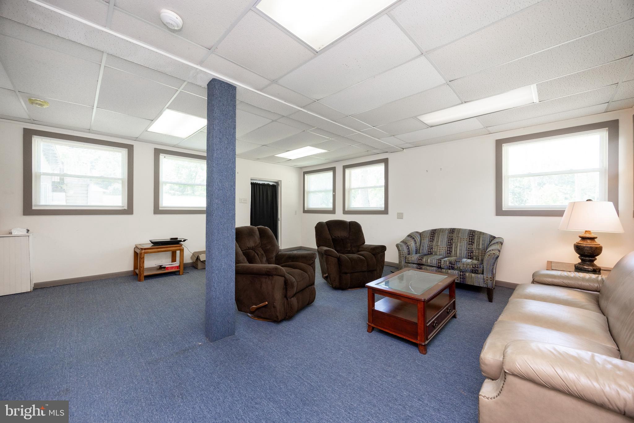 2488 Sanatoga Road Pottstown, PA 19464 - Photo 27 of 92 a living room with furniture and a large window