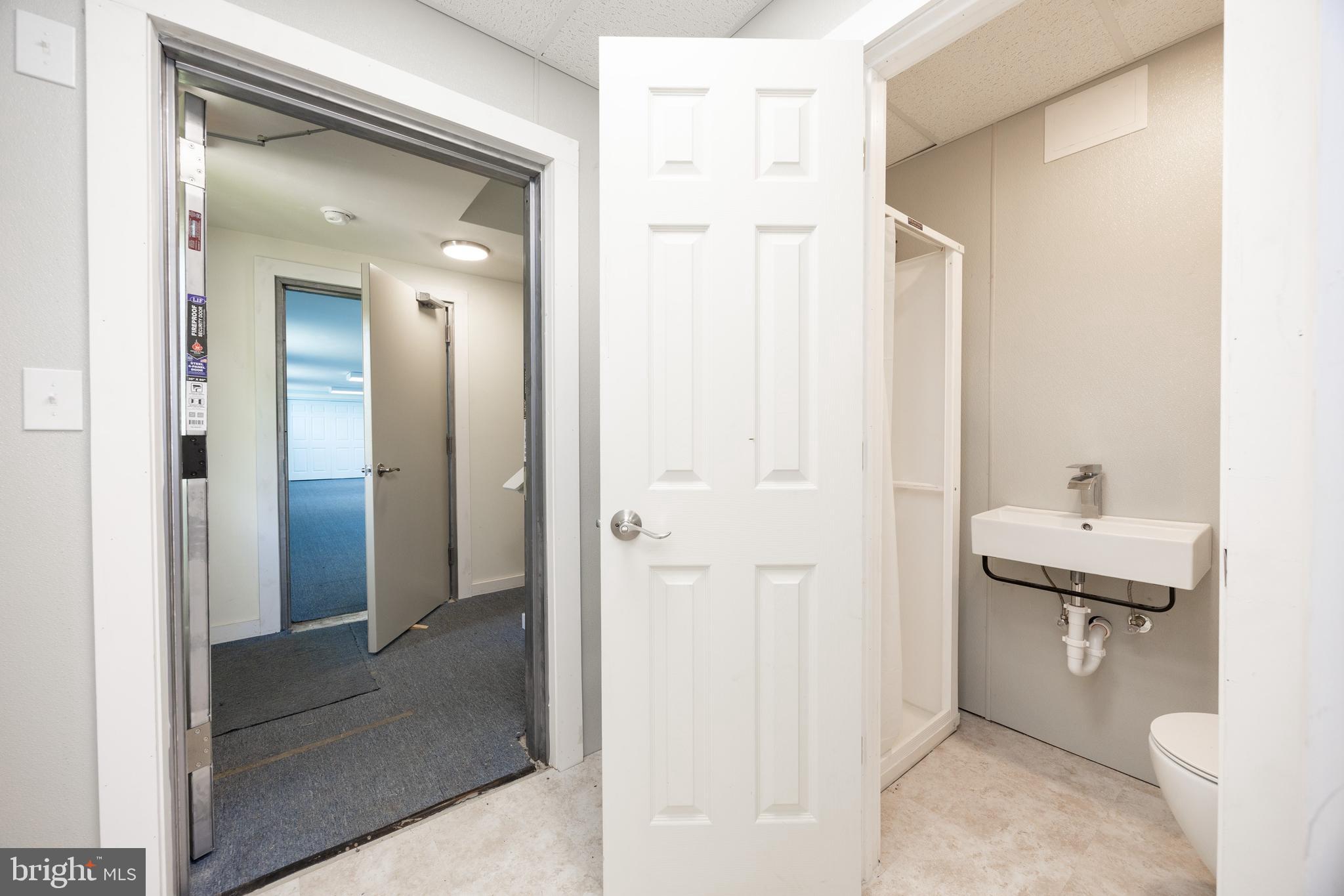 2488 Sanatoga Road Pottstown, PA 19464 - Photo 29 of 92 a bathroom with a sink and mirror