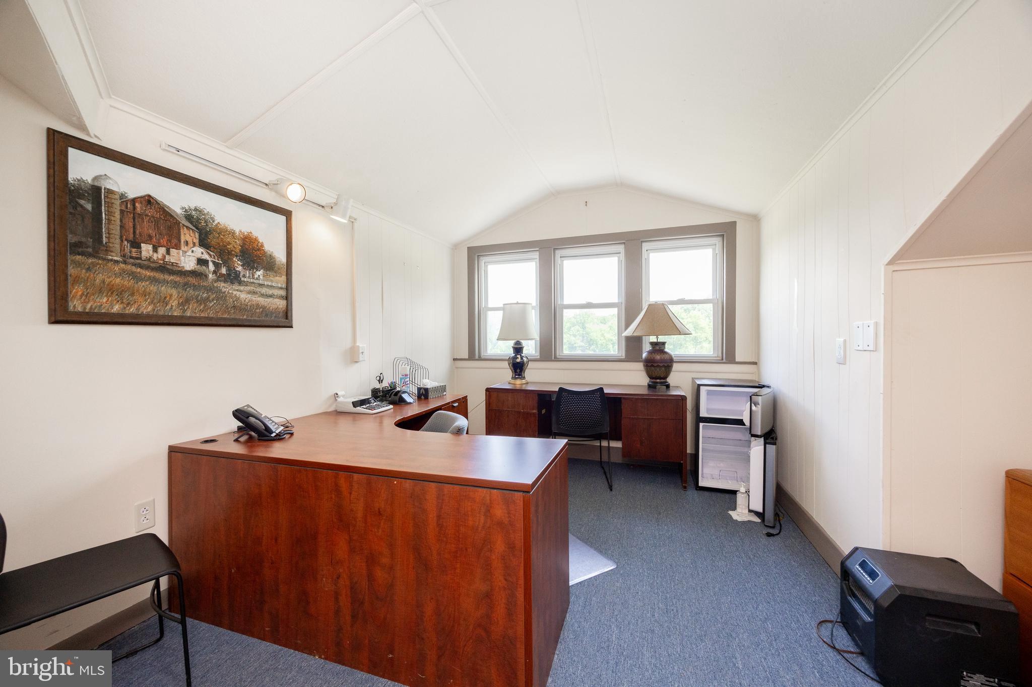 2488 Sanatoga Road Pottstown, PA 19464 - Photo 36 of 92 a room with furniture a window and a painting on the wall