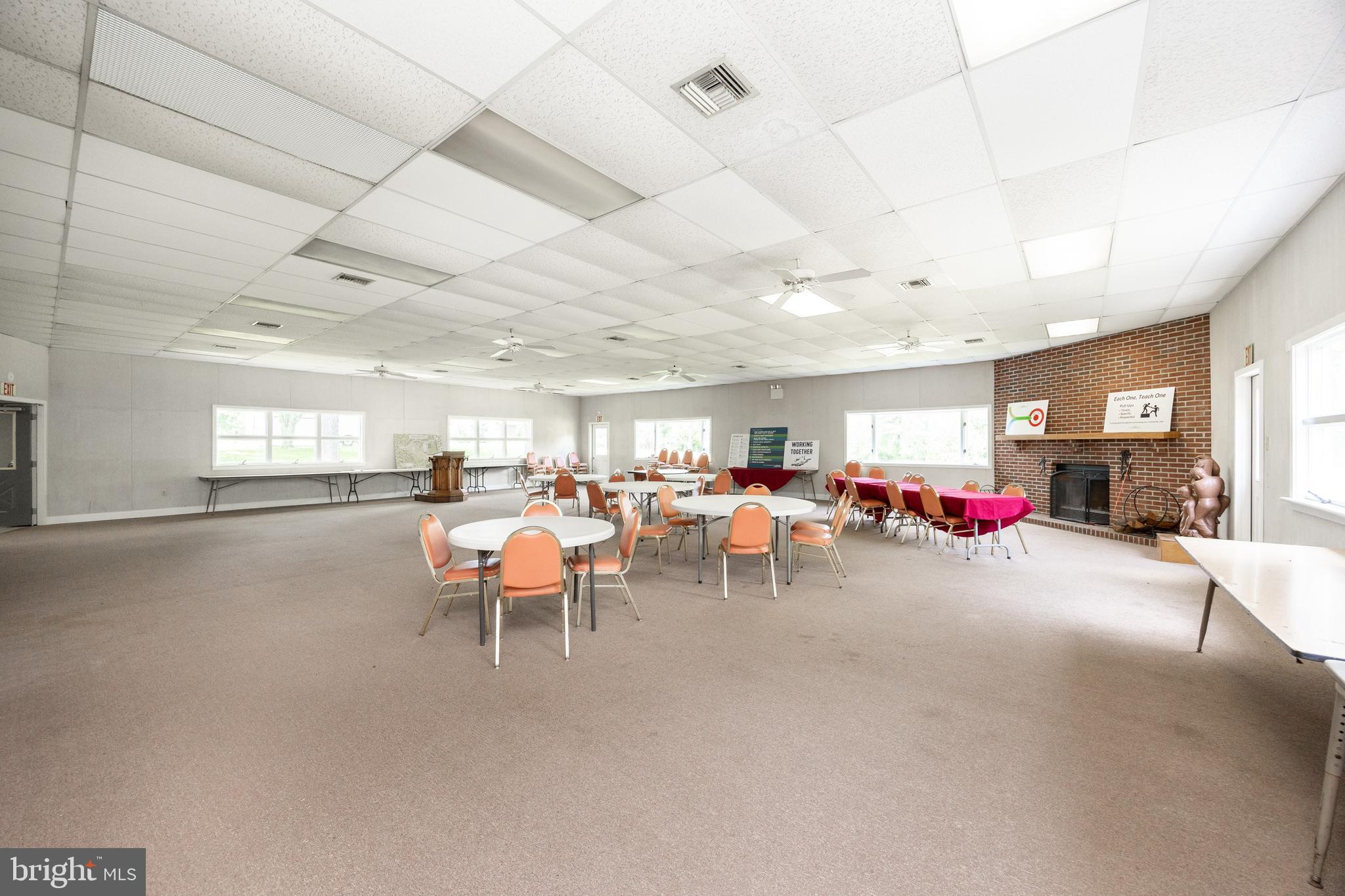2488 Sanatoga Road Pottstown, PA 19464 - Photo 47 of 92 a room with lots of furniture and a chandelier
