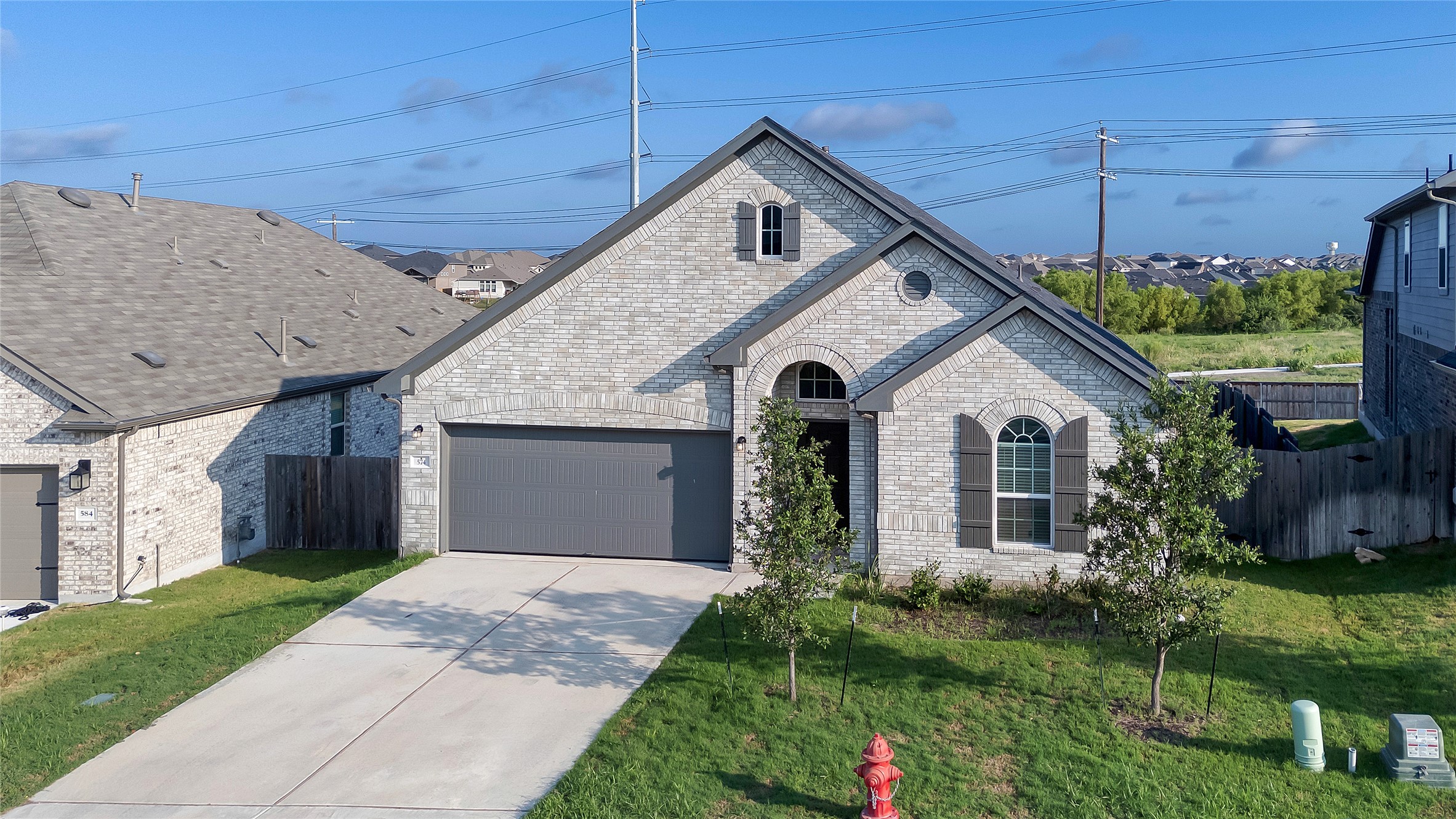 574 Sugar Cane Buda, TX 78610 - Photo 2 of 34 Aerial View of Front of House